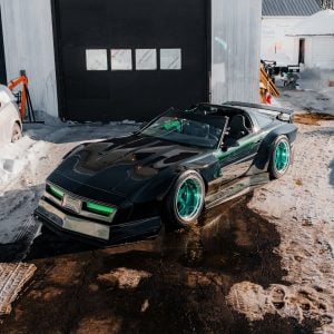 Black C4 Corvette fitted with Klutch K3001 wheels in the snow