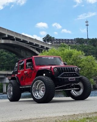 Custom Jeep with Klutch forged wheels — front three-quarter view