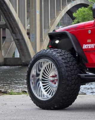 Close-up of polished Klutch forged wheel on a custom Jeep Wrangler