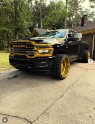 Custom Ram heavy-duty truck with Klutch forged wheels — front three-quarter view