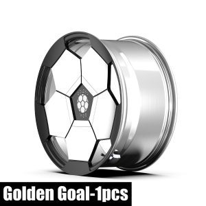 Side-angle rendering of the Klutch Golden Goal wheel showing its black and white face and polished barrel